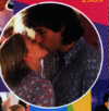 Julia and Robbie kissing